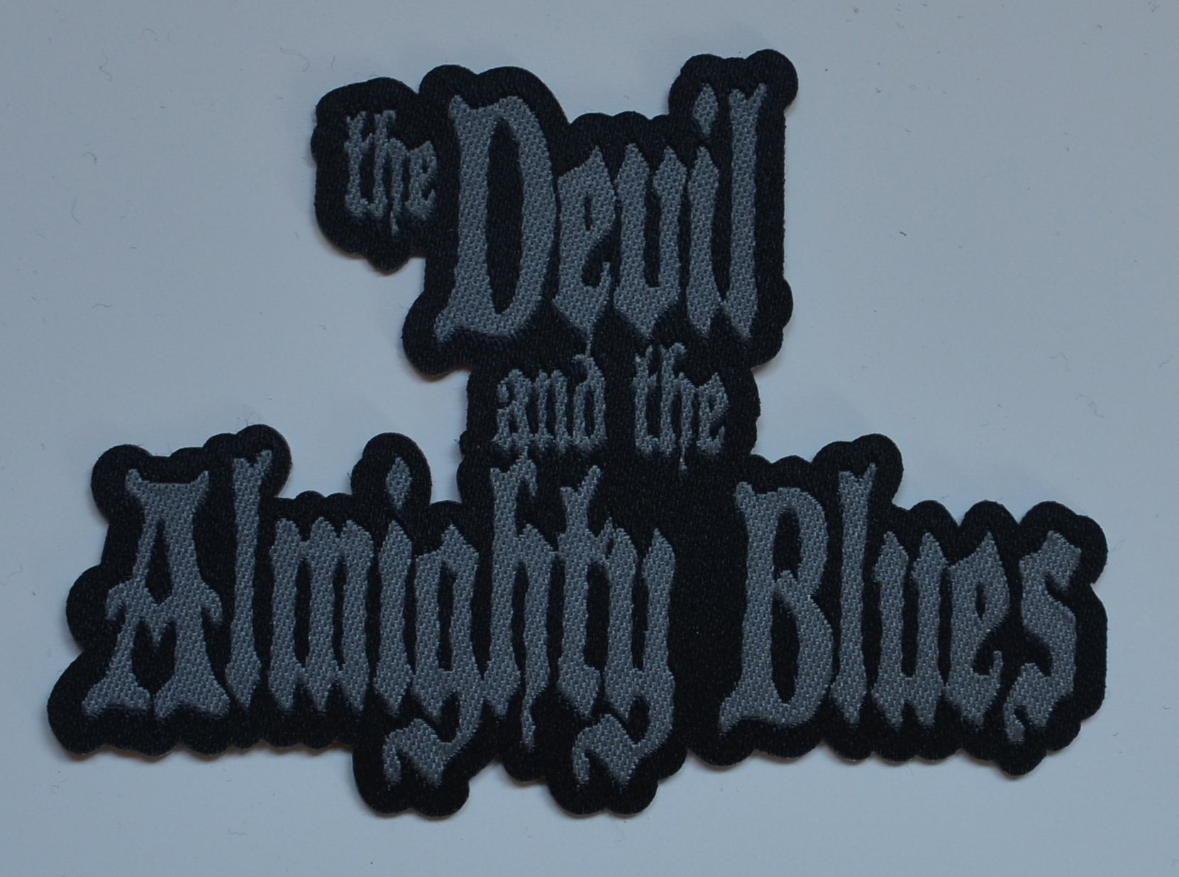THE DEVIL AND THE ALMIGHTY BLUES - Woven Logo - 8,4 x 6,6 cm - Patch