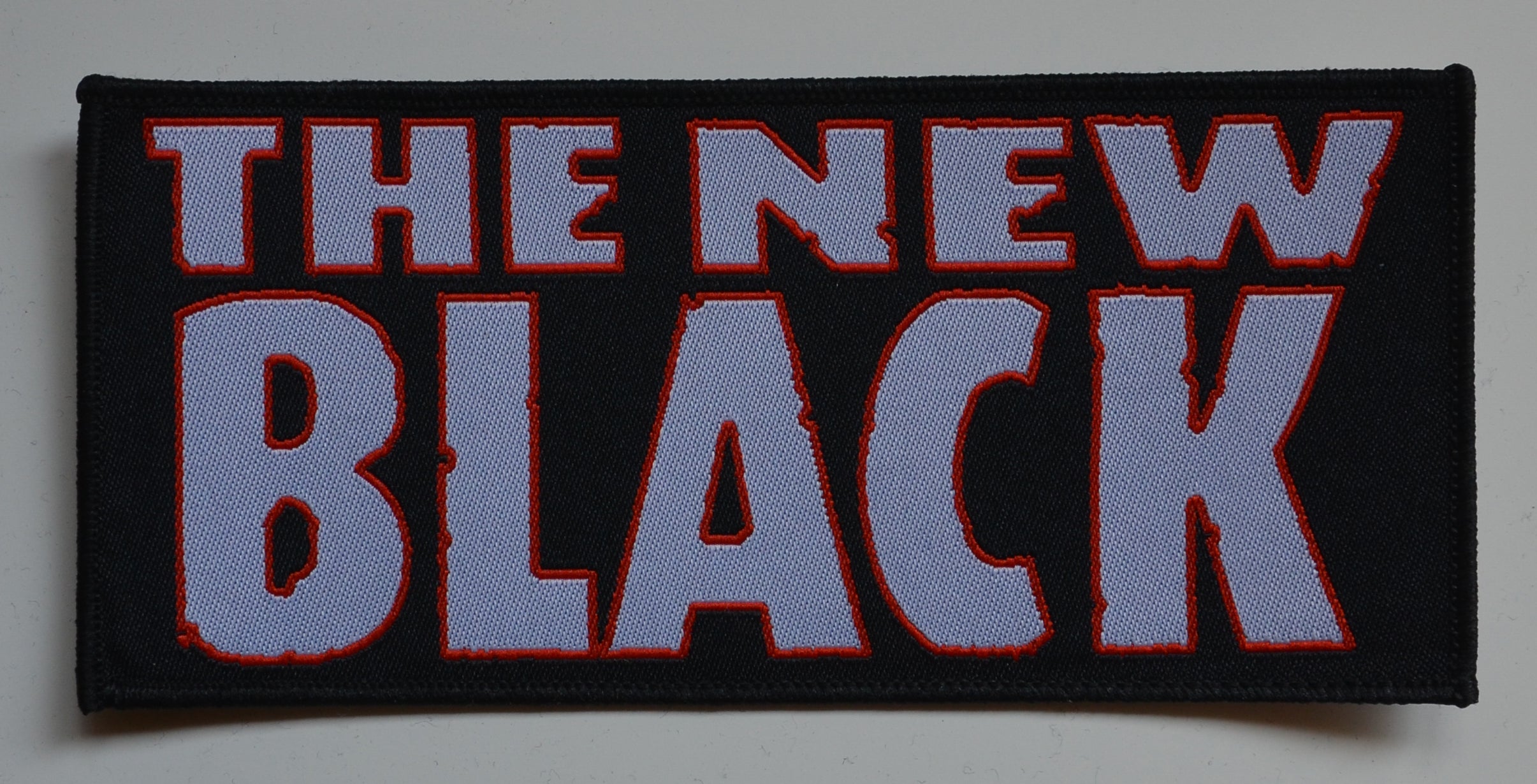 THE NEW BLACK - Logo - 14,5 x 6,5 cm - Patch